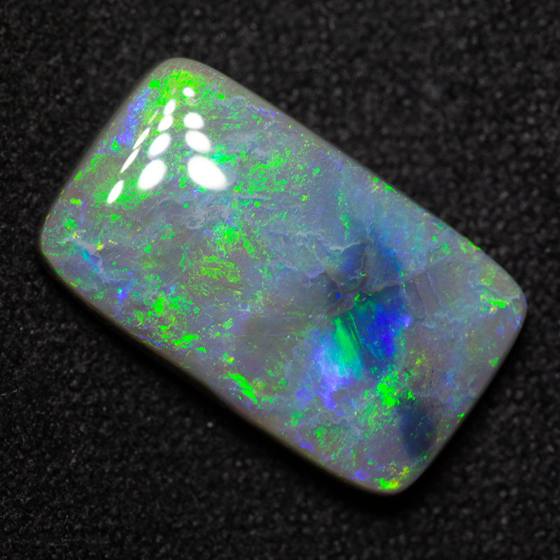 4.54 ct dark opal 15.3x9.2x4.2mm