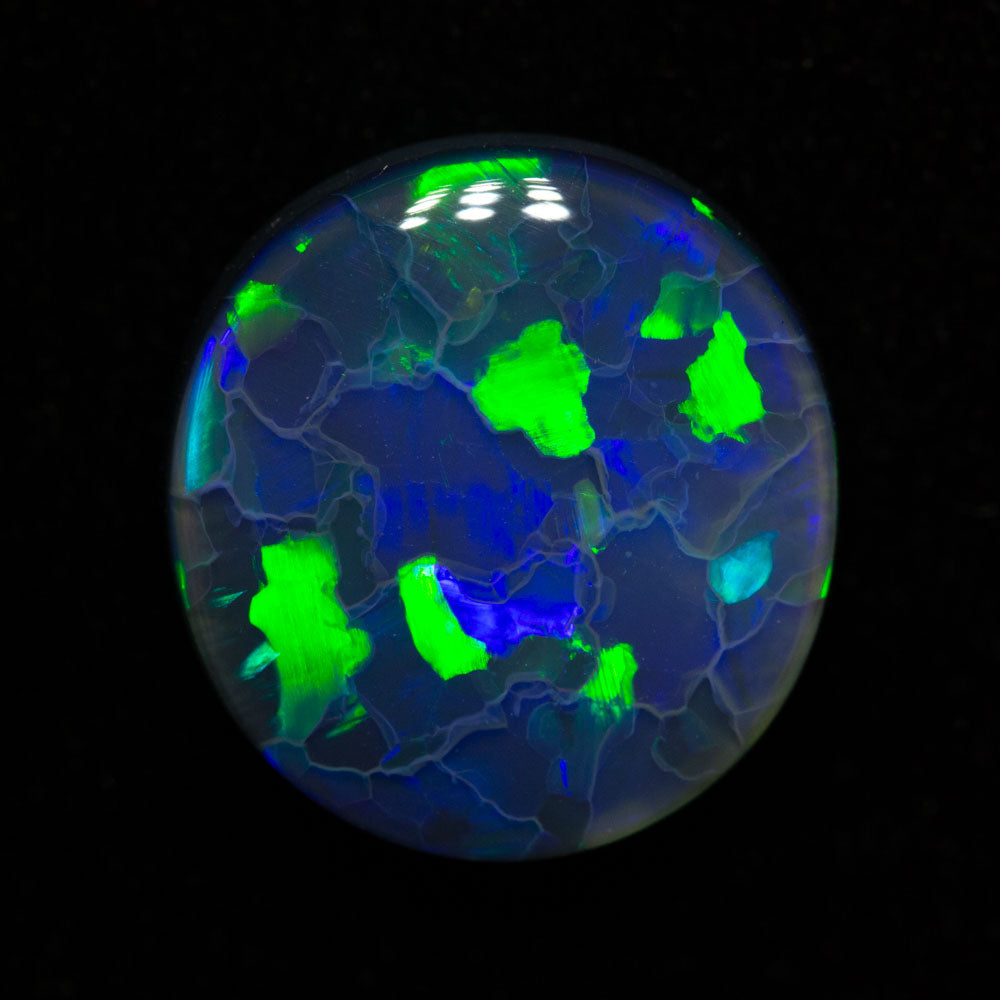 4.66 ct black opal 12.4x11.6x5mm