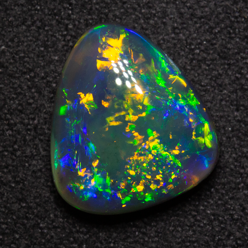 4.68 ct gem black opal 12.3x11x5.6mm