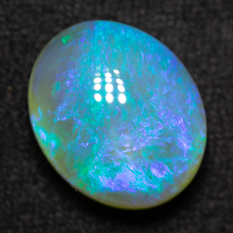 4.69 ct crystal opal 12.1x10x6.4mm