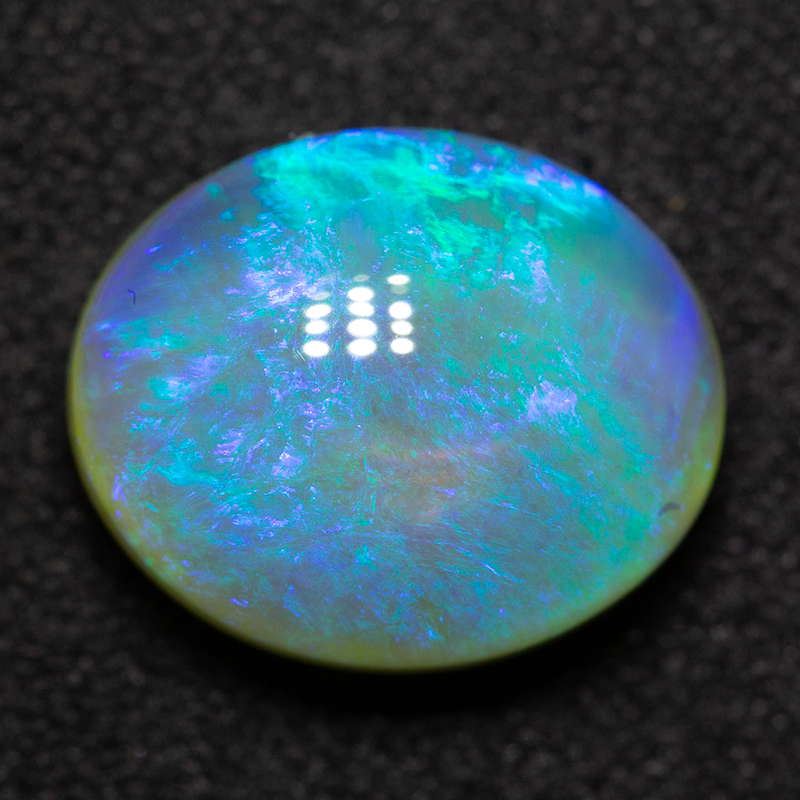 4.69 ct crystal opal 12.1x10x6.4mm