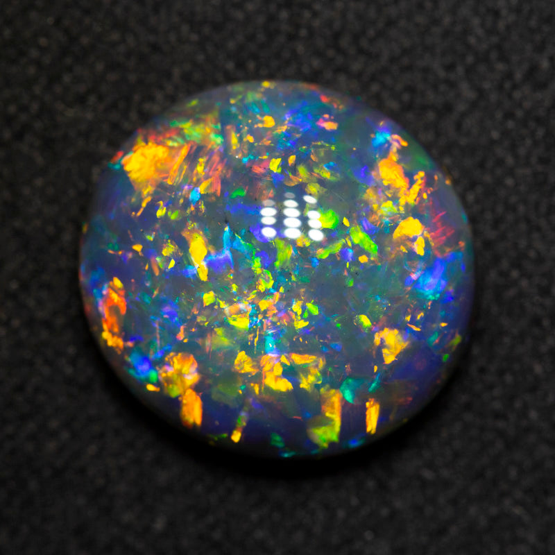 4.80 ct gem black opal 12.8x11.9x5.1mm