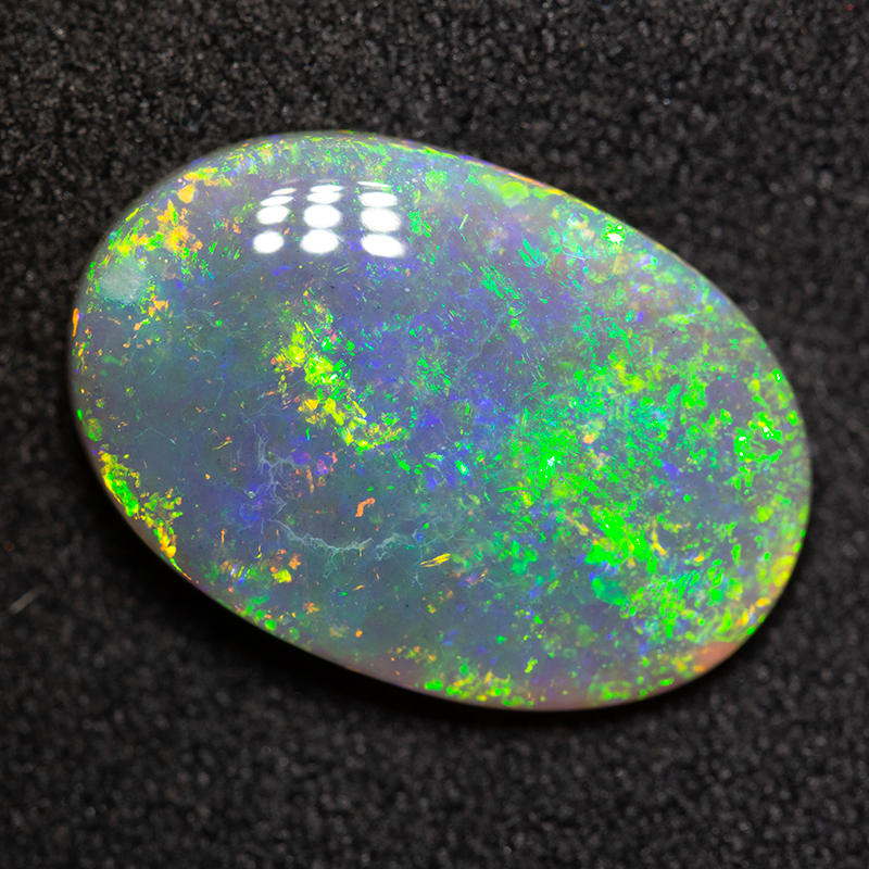 4.84 ct black opal 16.2x11.1x4.4mm