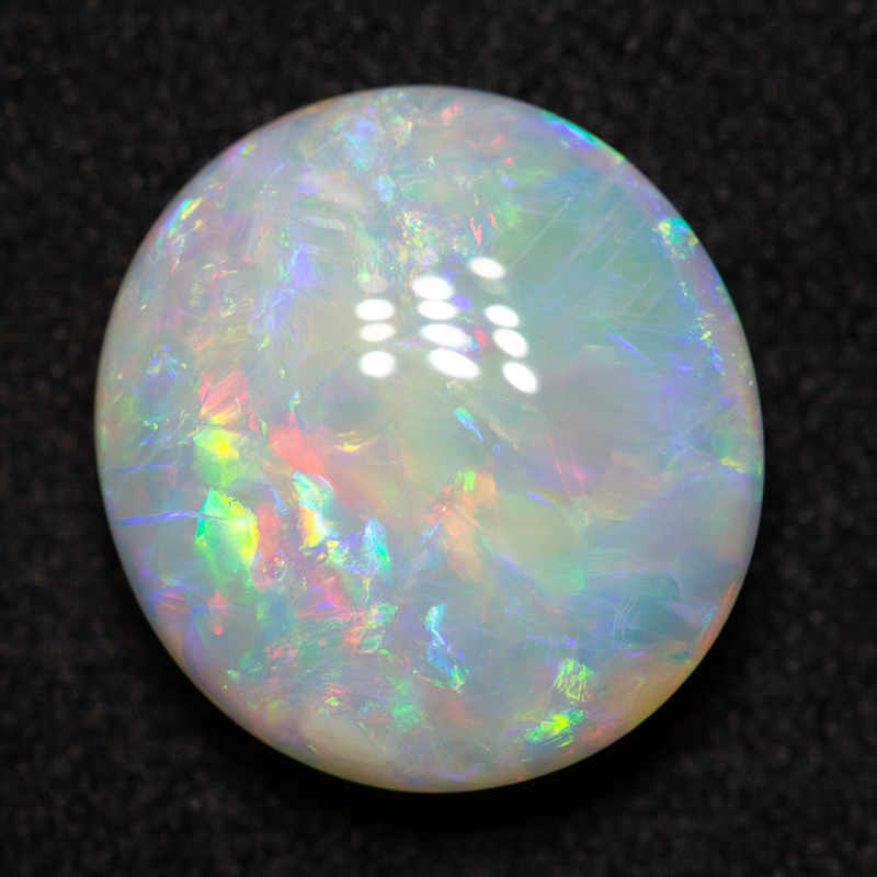 4.91 ct white opal 12.5x11.5x5 mm