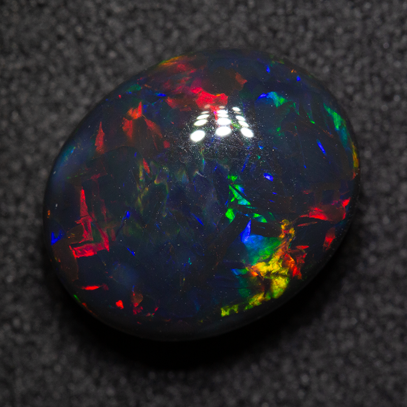 4.91 ct gem black opal 12x10x6.5mm