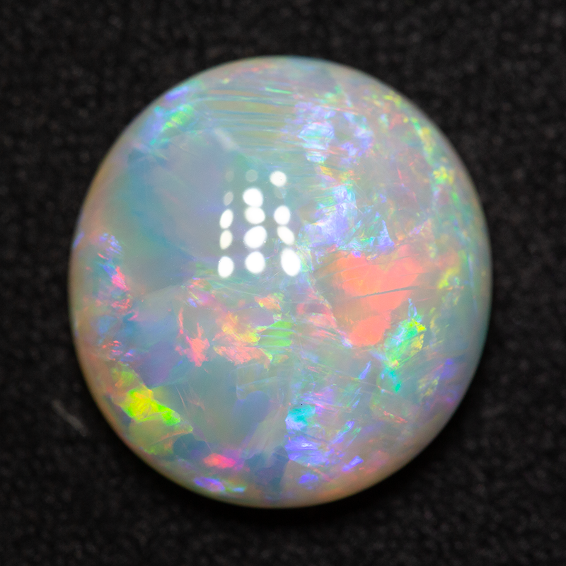 4.91 ct white opal 12.5x11.5x5 mm