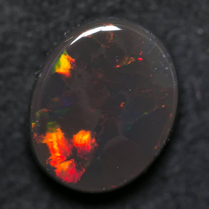 4.97 ct black opal 14x11x4.5mm