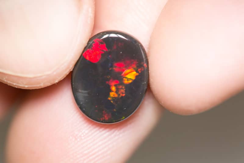 4.97 ct black opal 14x11x4.5mm