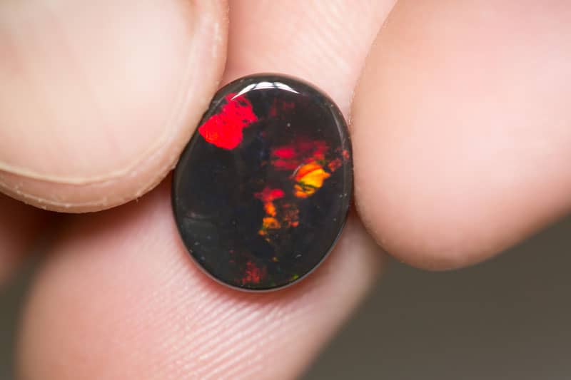 4.97 ct black opal 14x11x4.5mm