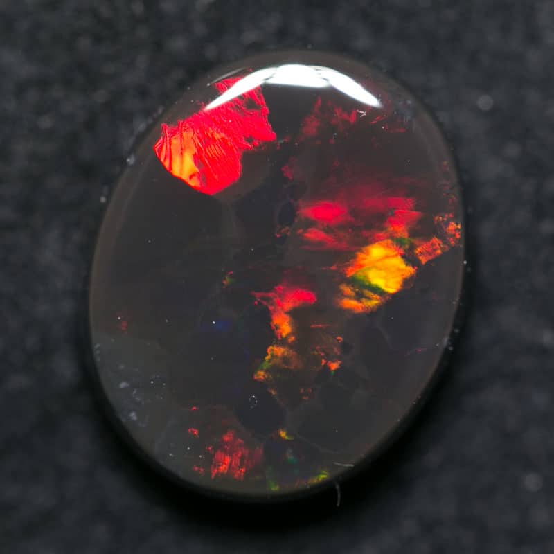 4.97 ct black opal 14x11x4.5mm