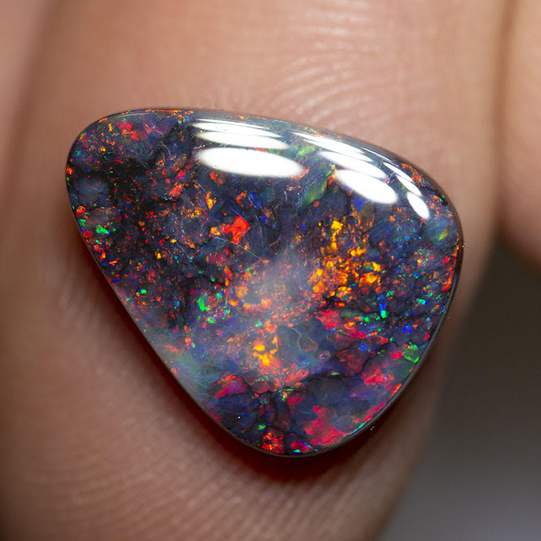 5.01 ct black opal 15.6x12.4x4mm