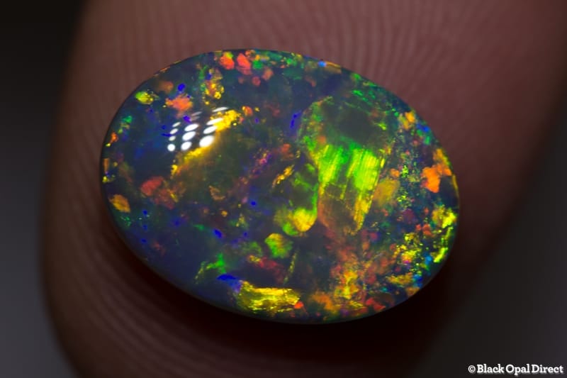 5.06 ct semi black gem opal 14.5x11x5mm