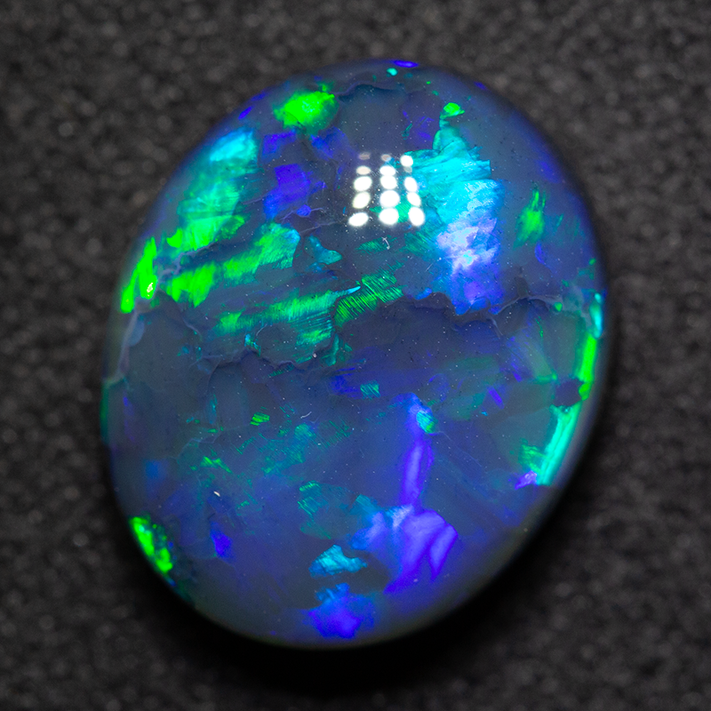 5.29 ct black opal 12.7x10.6x6.1mm