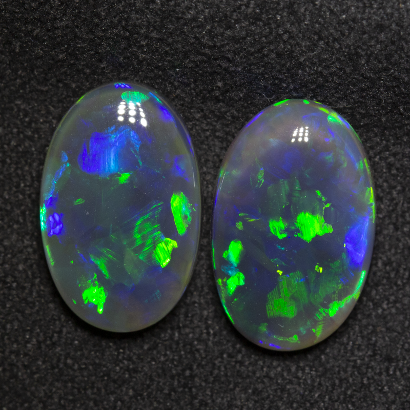 5.45 ct black opal pair 12.4x8x4.3mm