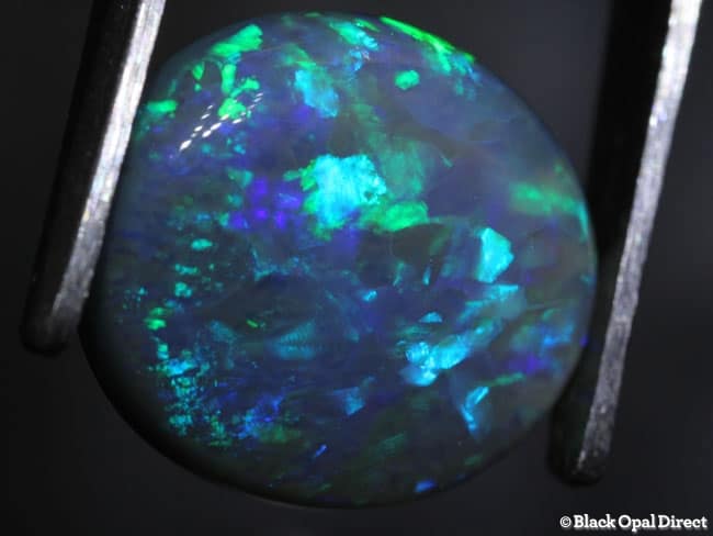 5.49 ct semi black opal 13.5x12.5x5mm