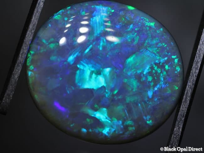 5.49 ct semi black opal 13.5x12.5x5mm