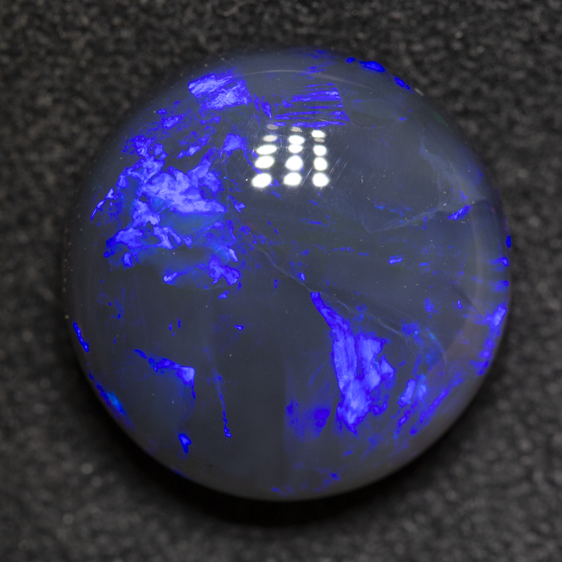 5.66 ct black opal 12.2x12x6.3mm