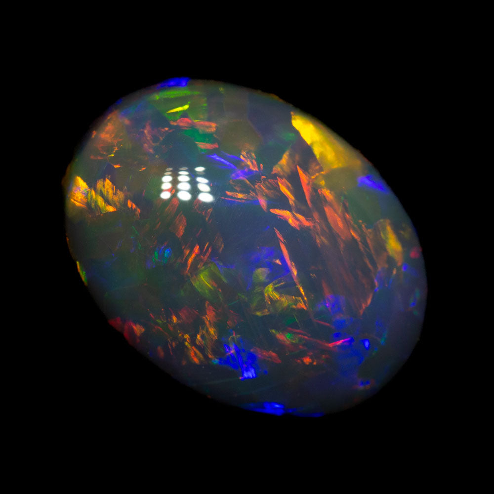 5.66 ct gem double-sided black opal 13.4x10.1x6.4mm