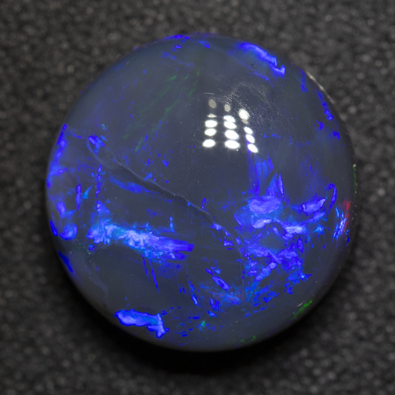 5.66 ct black opal 12.2x12x6.3mm