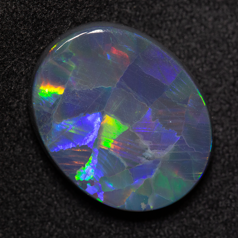 5.67 ct black opal 16x13x4 mm