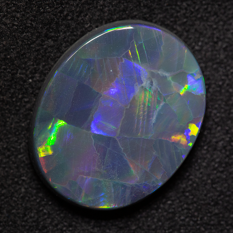 5.67 ct black opal 16x13x4 mm