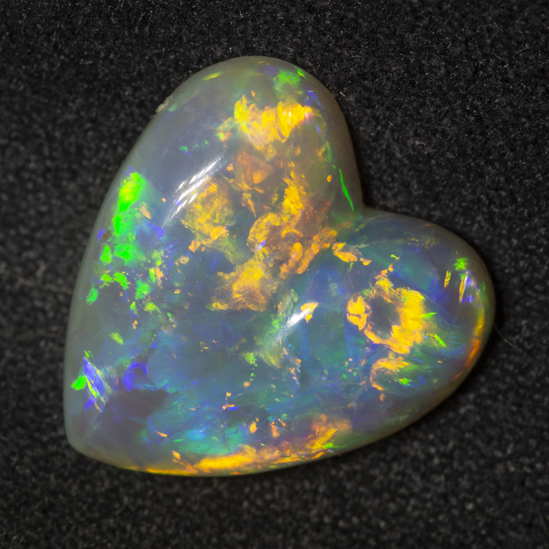 5.81 ct dark opal 14.7x14.4x4.8mm