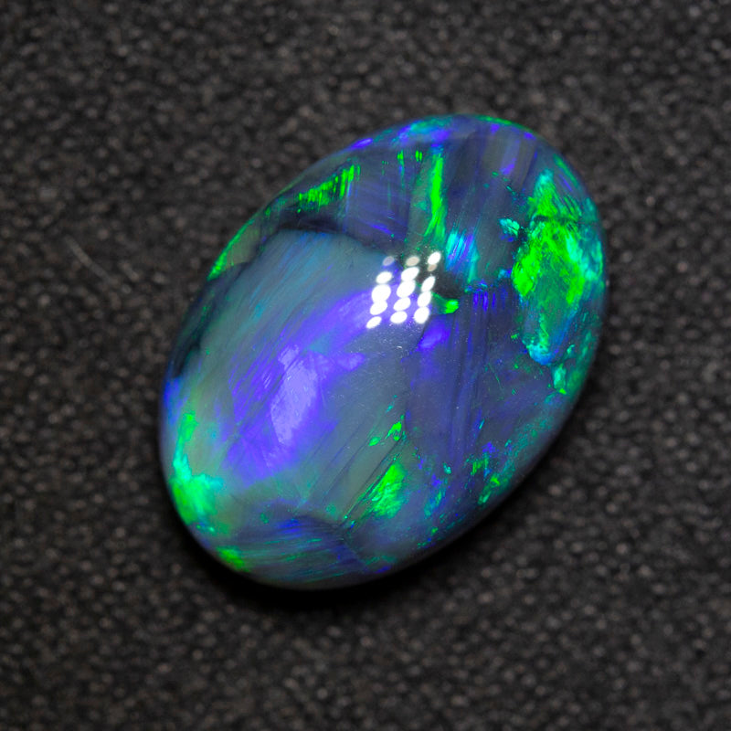 5.84 ct gem black opal 13.7x9.7x6.5mm