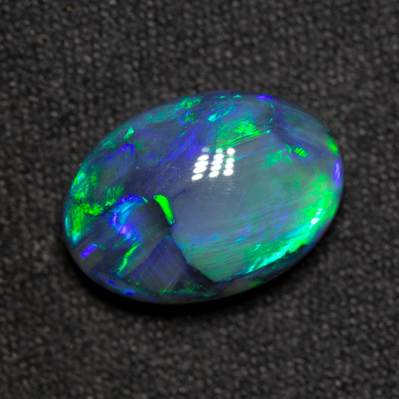 5.84 ct gem black opal 13.7x9.7x6.5mm