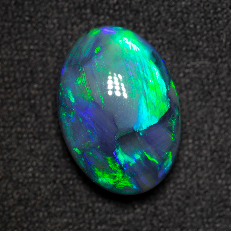 5.84 ct gem black opal 13.7x9.7x6.5mm