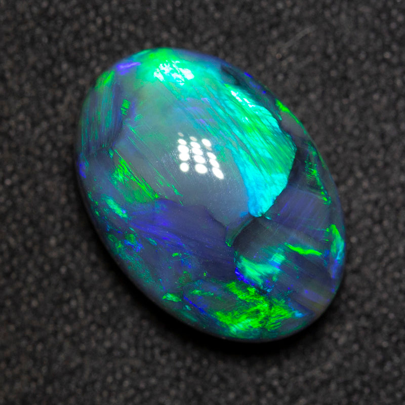 5.84 ct gem black opal 13.7x9.7x6.5mm