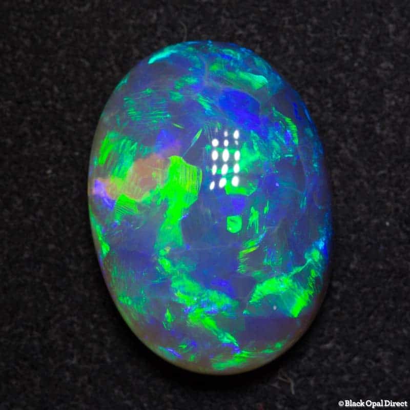 5.86 ct semi black crystal opal 15x11x5.5