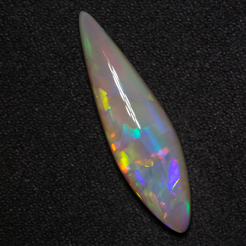5.87 ct dark opal 27x7.5x5.4mm