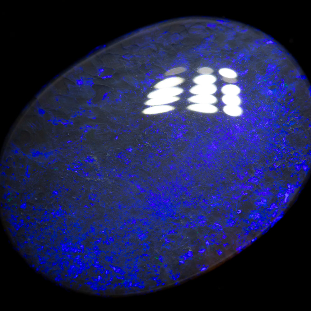 56.29 ct black opal 36x25x10.2mm