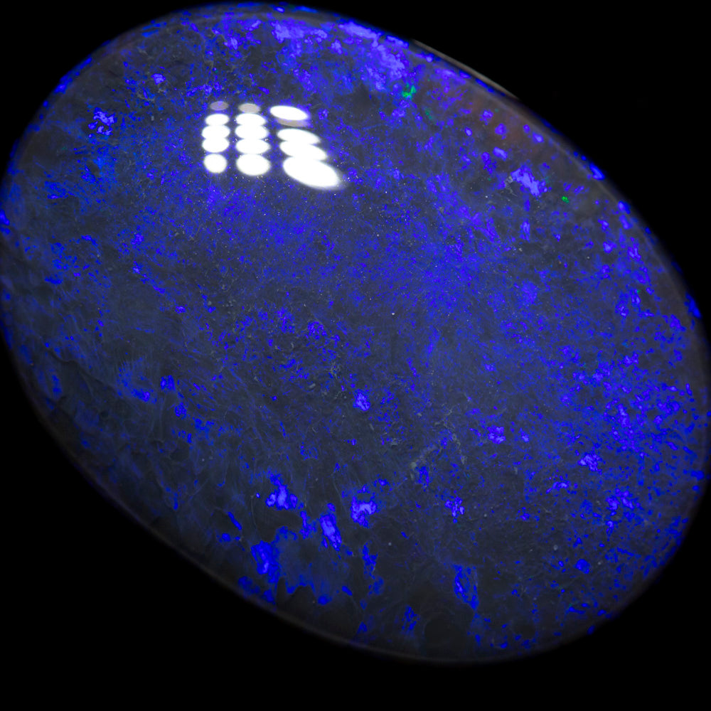 56.29 ct black opal 36x25x10.2mm