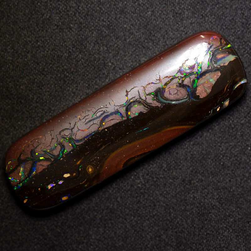 58.73 ct boulder opal 45x13.8x7.4mm