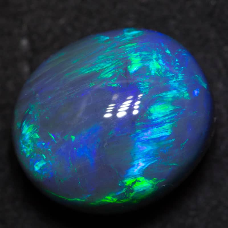 6.19 ct gem black opal 12.2x10.2x8mm