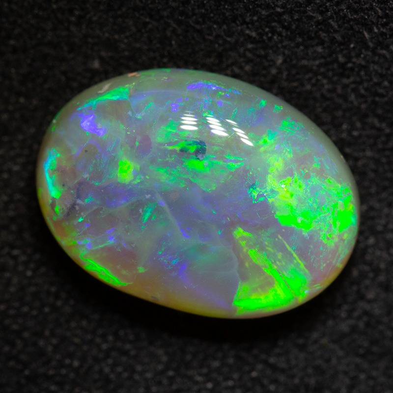 6.32 ct crystal opal 14.4x10.5x6.7mm
