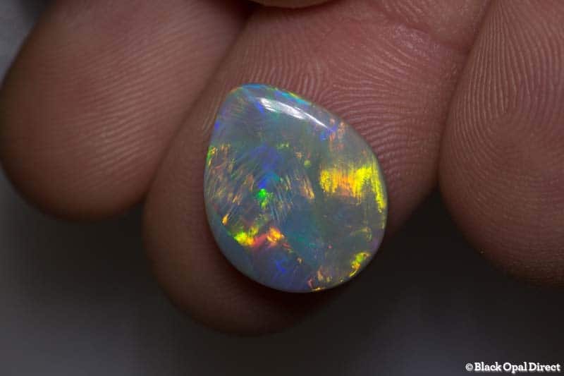 6.33 ct semi black double sided opal 16x13x5.5mm