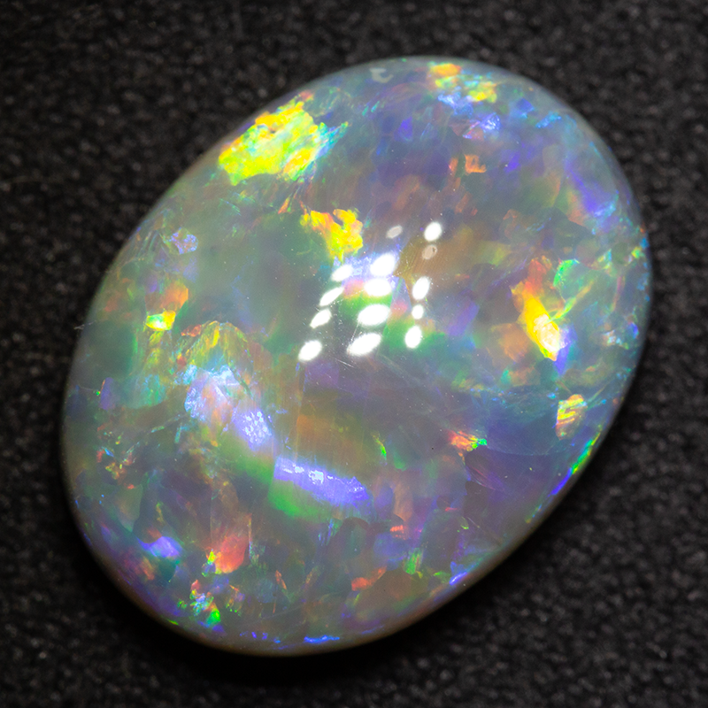 6.52 ct dark opal 16x12x6 mm
