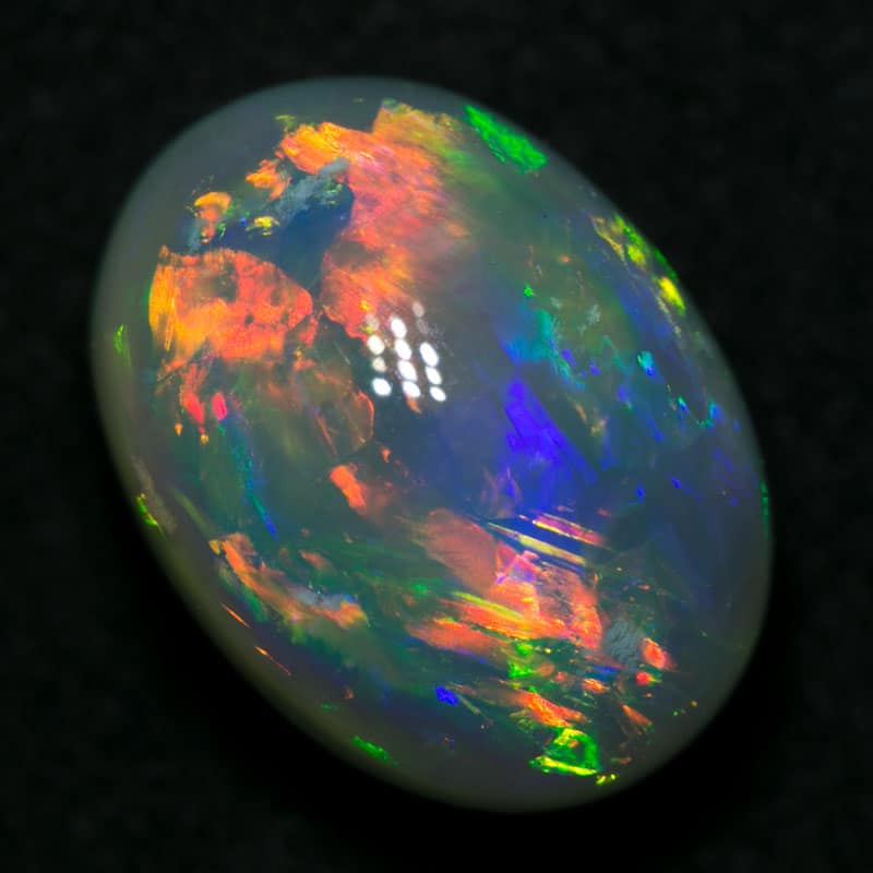 6.86 ct gem black opal 13.5x10x8mm