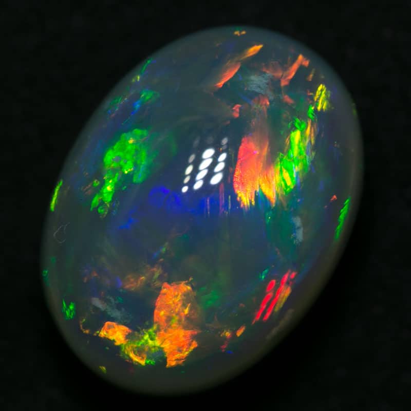6.86 ct gem black opal 13.5x10x8mm