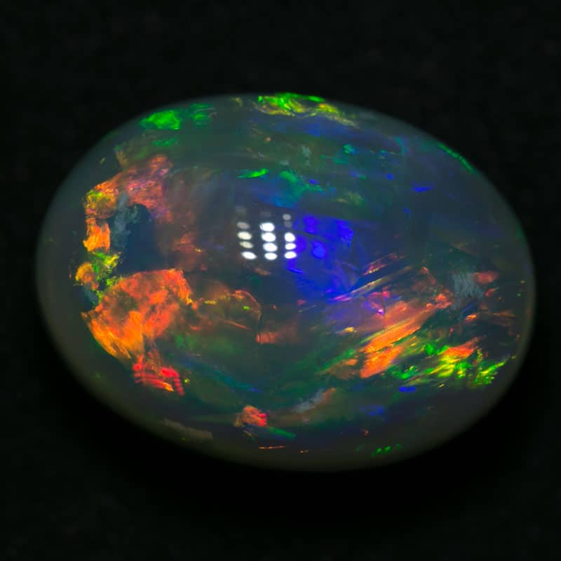 6.86 ct gem black opal 13.5x10x8mm