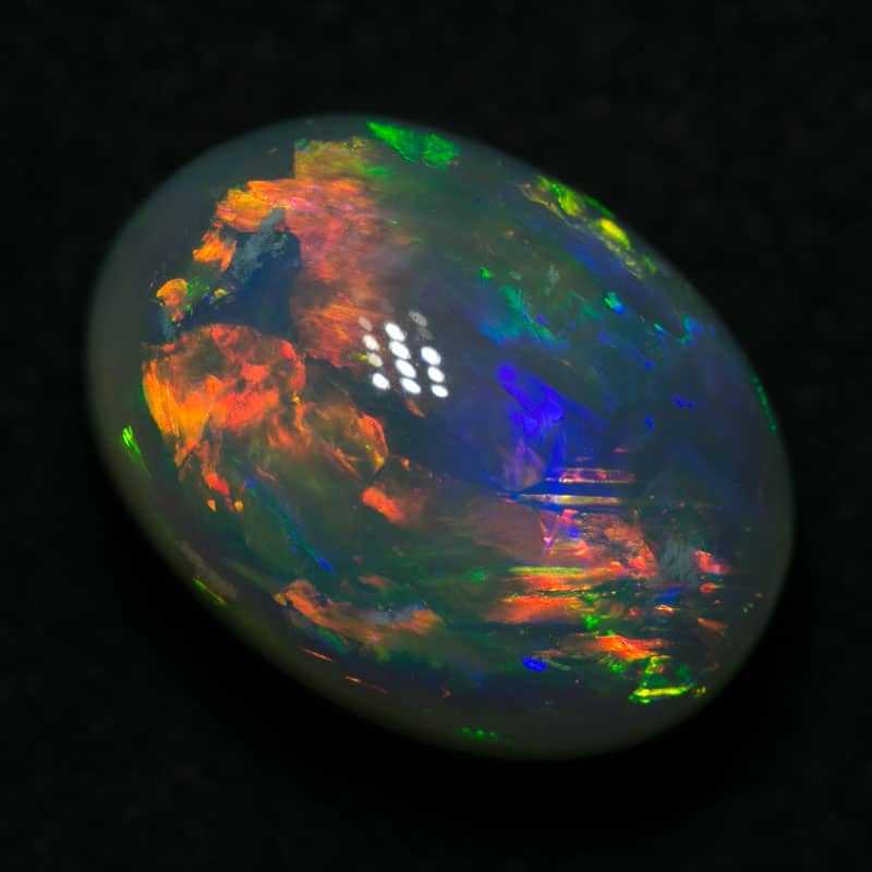 6.86 ct gem black opal 13.5x10x8mm