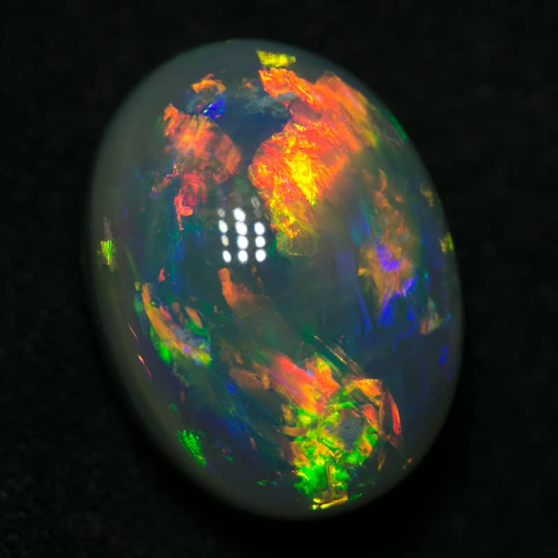 6.86 ct gem black opal 13.5x10x8mm