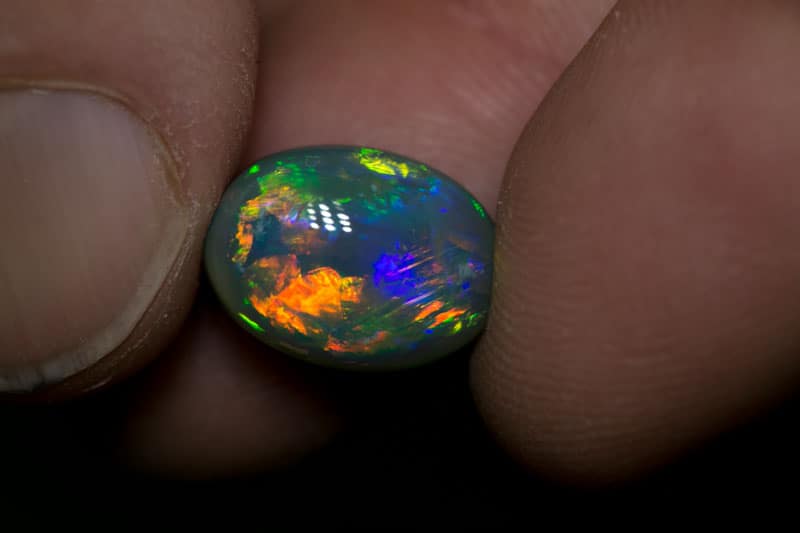 6.86 ct gem black opal 13.5x10x8mm