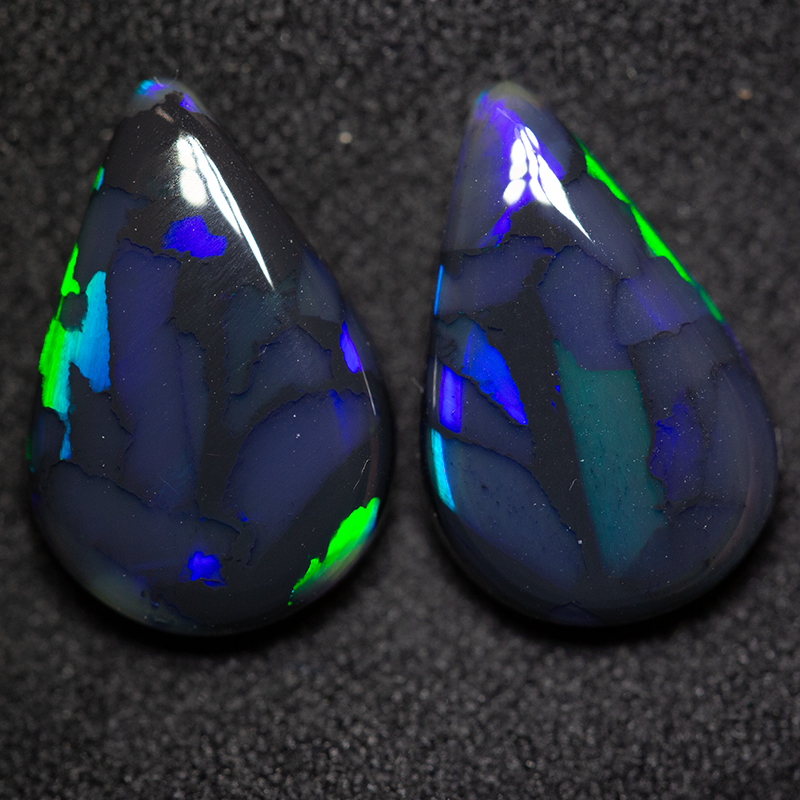 6.95 ct gem black opal pair 14.3x9.5x4.4mm