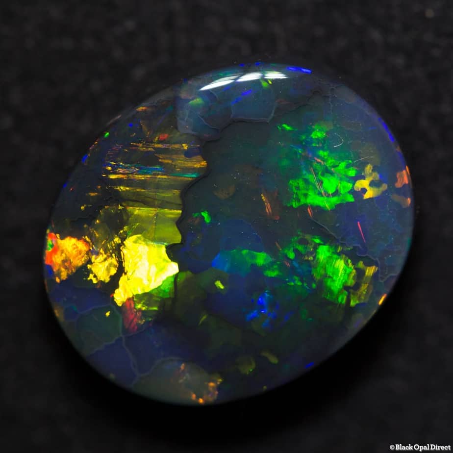 6.95 ct gem black opal 15x12x5.5mm