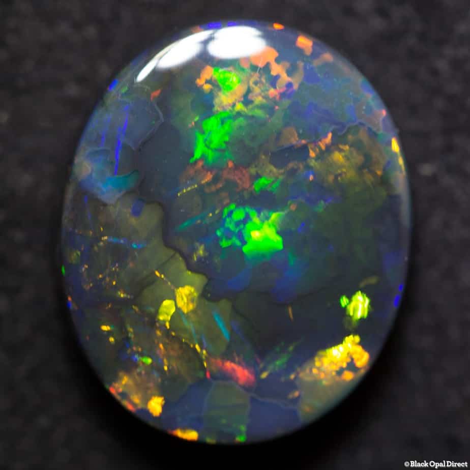 6.95 ct gem black opal 15x12x5.5mm