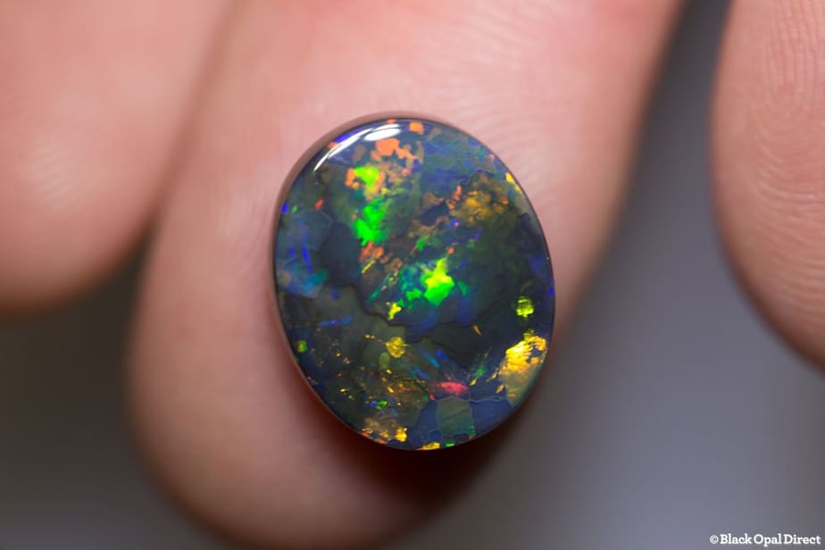 6.95 ct gem black opal 15x12x5.5mm