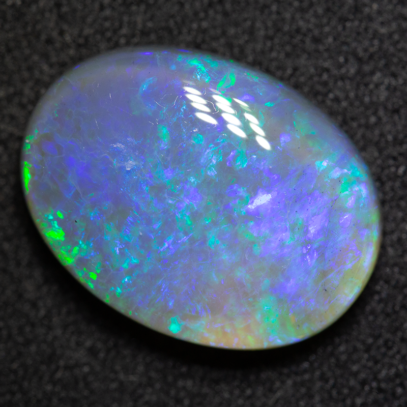 6.97 ct dark opal 16.1x11.9x5.5mm